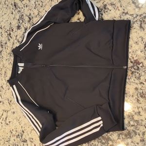 Adidas woman's black zip up jacket, size medium.